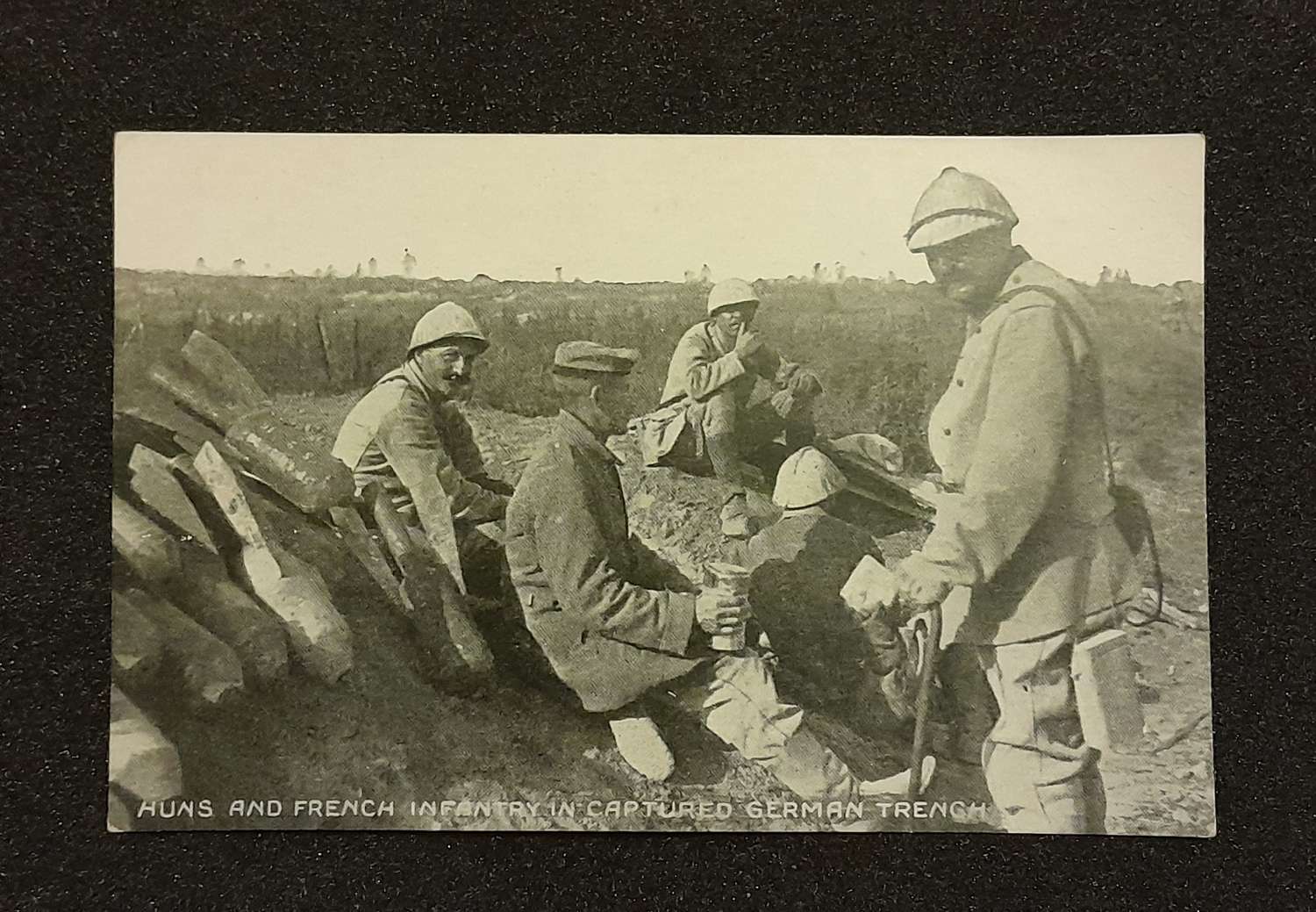 Hun Prisoners help wounded Frenchmen