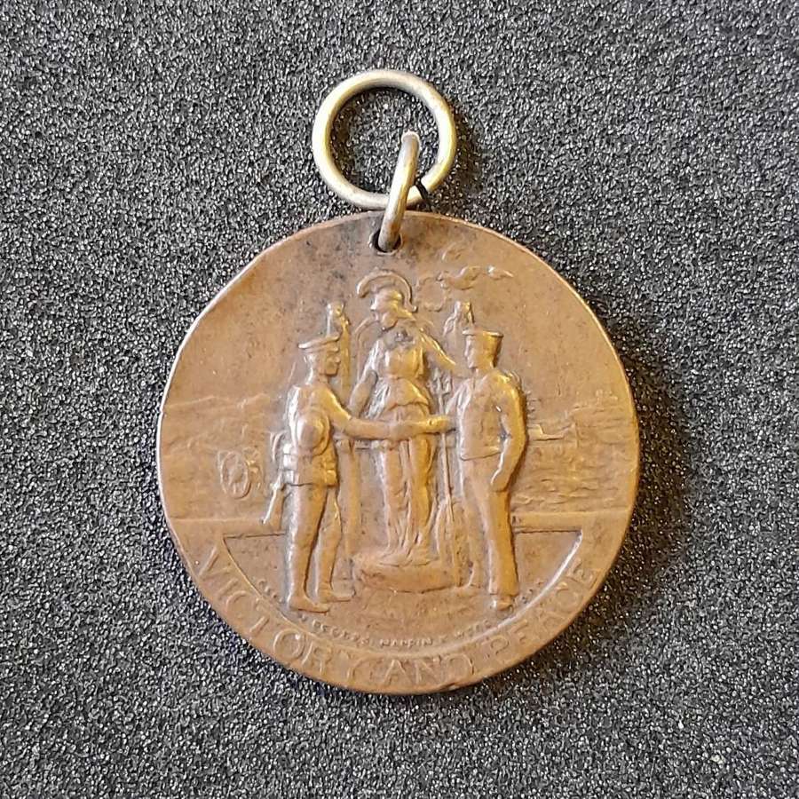 Battersea Pals victory and peace medal