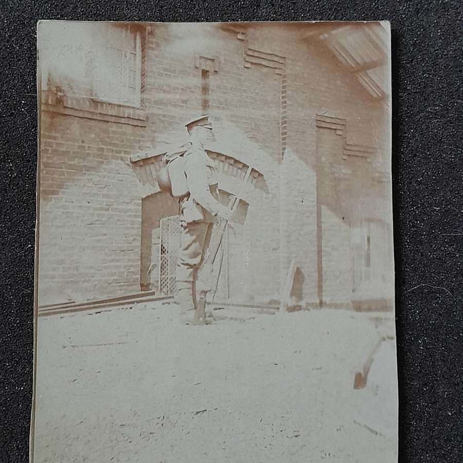 Photo Postcard of Soldier standing guard
